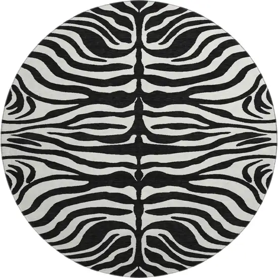 8' Black And Ivory Animal Print Washable Round Rug With UV Protection Photo 1