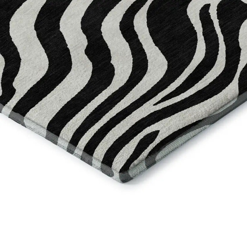 8' Black And Ivory Animal Print Washable Round Rug With UV Protection Photo 5