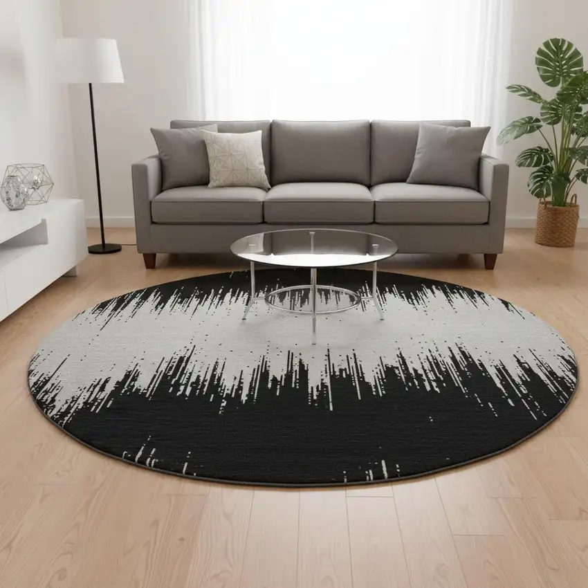 8' Black And Ivory Chevron Washable Round Rug With UV Protection Photo 2