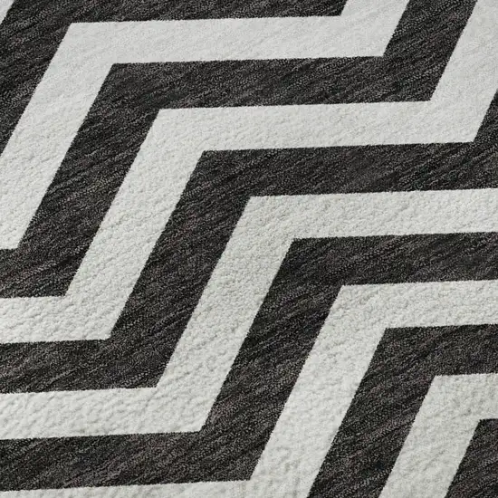 8' Black And Ivory Chevron Washable Round Rug With UV Protection Photo 9