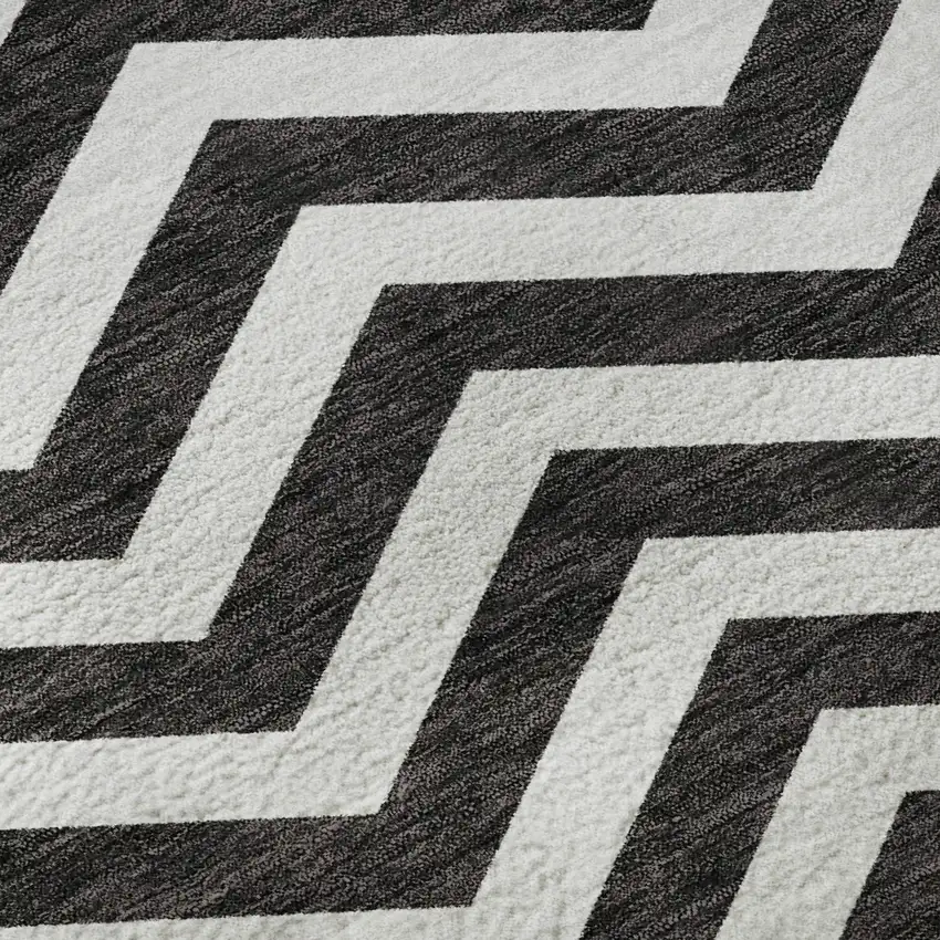 8' Black And Ivory Chevron Washable Round Rug With UV Protection Photo 9