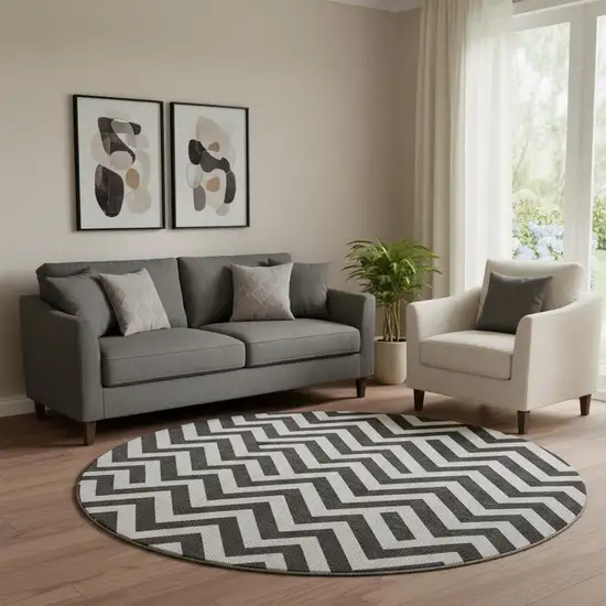 8' Black And Ivory Chevron Washable Round Rug With UV Protection Photo 1