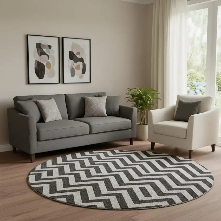 8' Black And Ivory Chevron Washable Round Rug With UV Protection Photo 1