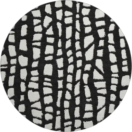 8' Black And Ivory Cobblestone Washable Round Rug With UV Protection Photo 1