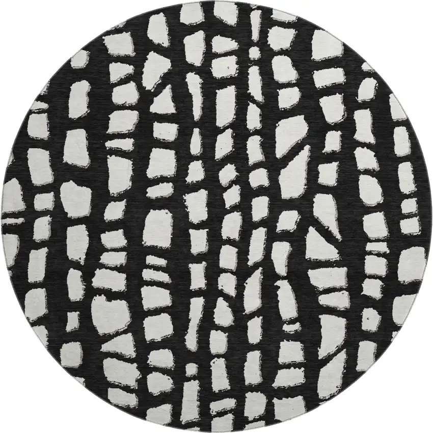 8' Black And Ivory Cobblestone Washable Round Rug With UV Protection Photo 1