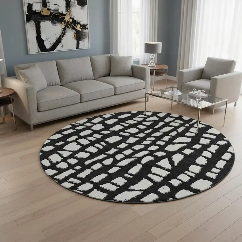 8' Black And Ivory Cobblestone Washable Round Rug With UV Protection Photo 2