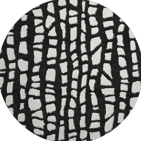 8' Black And Ivory Cobblestone Washable Round Rug With UV Protection Photo 4