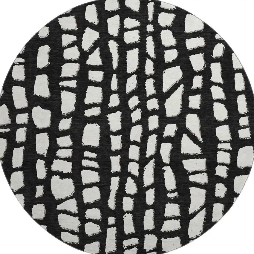 8' Black And Ivory Cobblestone Washable Round Rug With UV Protection Photo 4