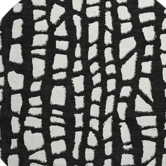 8' Black And Ivory Cobblestone Washable Round Rug With UV Protection Photo 3