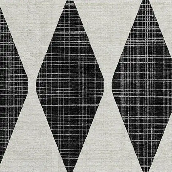 8' Black And Ivory Diamond Washable Round Rug With UV Protection Photo 4