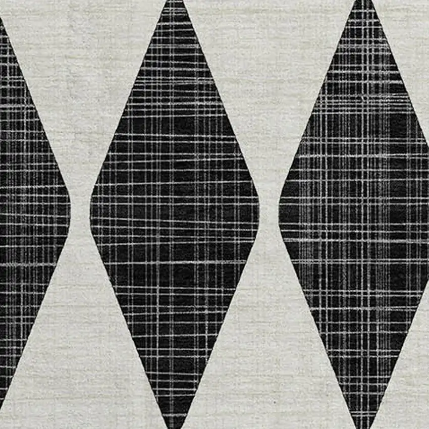 8' Black And Ivory Diamond Washable Round Rug With UV Protection Photo 4