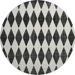 Photo of 8' Black And Ivory Diamond Washable Round Rug With UV Protection