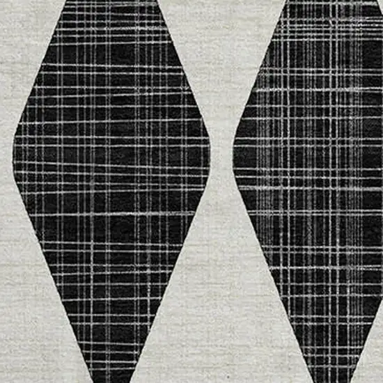 8' Black And Ivory Diamond Washable Round Rug With UV Protection Photo 3