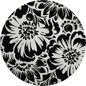 Photo of 8' Black And Ivory Floral Washable Round Rug With UV Protection
