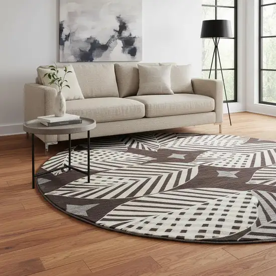 8' Black And Ivory Floral Washable Round Rug With UV Protection Photo 2