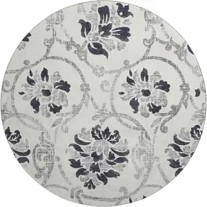 Photo of 8' Black And Ivory Floral Washable Round Rug With UV Protection