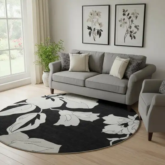 8' Black And Ivory Floral Washable Round Rug With UV Protection Photo 1