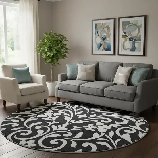 8' Black And Ivory Floral Washable Round Rug With UV Protection Photo 1