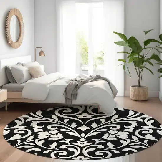 8' Black And Ivory Floral Washable Round Rug With UV Protection Photo 5