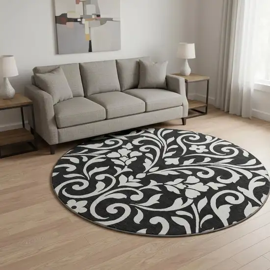 8' Black And Ivory Floral Washable Round Rug With UV Protection Photo 2