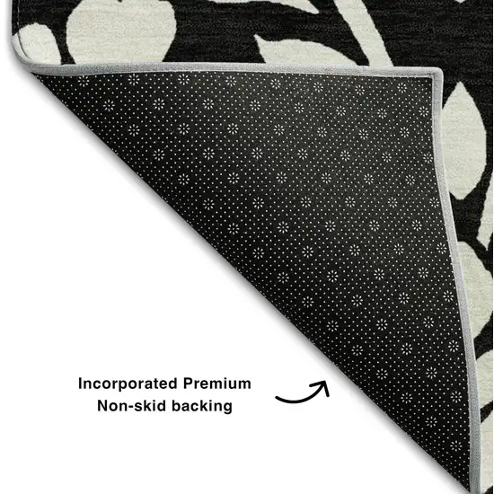 8' Black And Ivory Floral Washable Round Rug With UV Protection Photo 6
