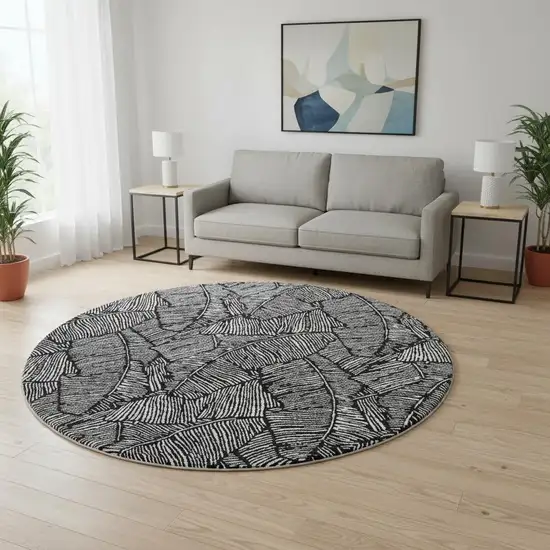 8' Black And Ivory Floral Washable Round Rug With UV Protection Photo 2