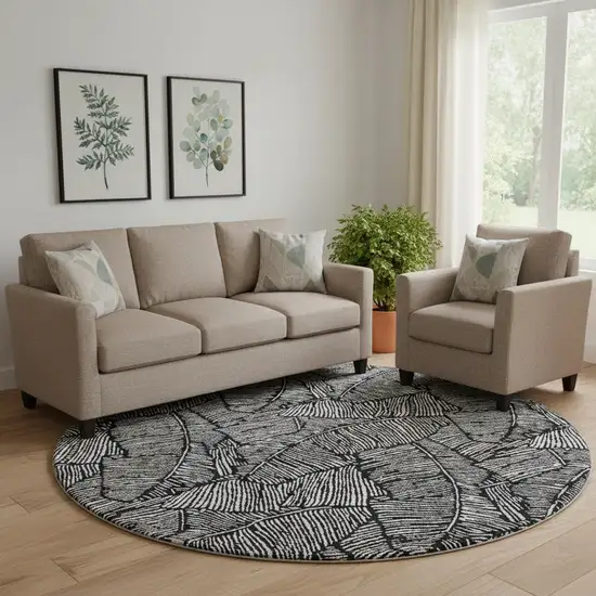 8' Black And Ivory Floral Washable Round Rug With UV Protection Photo 1