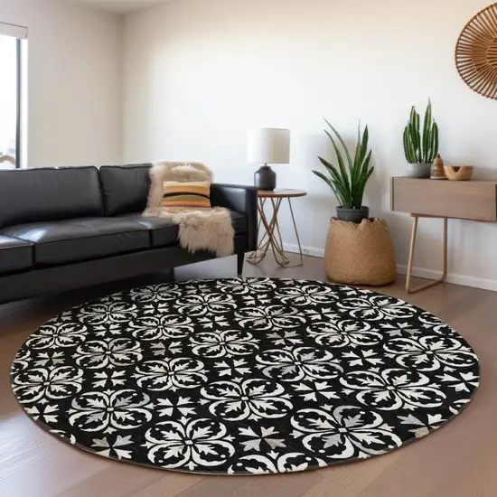 8' Black And Ivory Floral Washable Round Rug With UV Protection Photo 4
