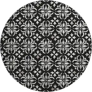 Photo of 8' Black And Ivory Floral Washable Round Rug With UV Protection