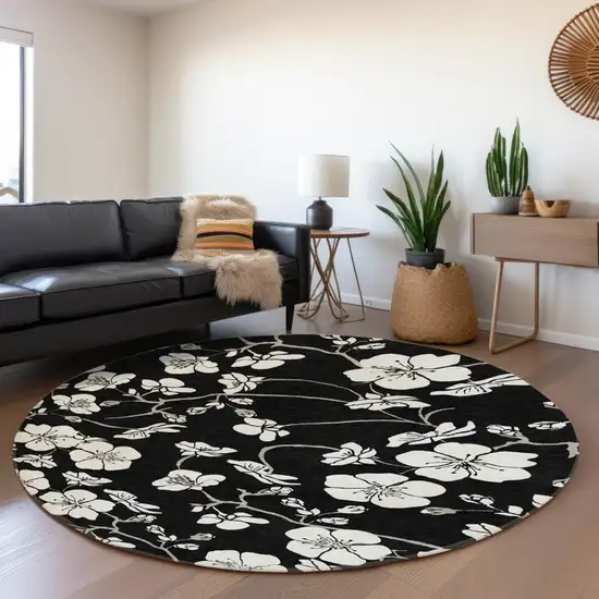 8' Black And Ivory Floral Washable Round Rug With UV Protection Photo 4