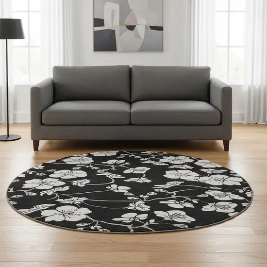 8' Black And Ivory Floral Washable Round Rug With UV Protection Photo 2