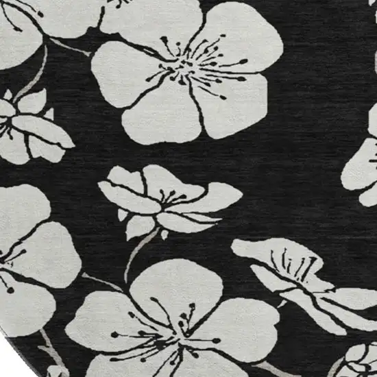 8' Black And Ivory Floral Washable Round Rug With UV Protection Photo 2