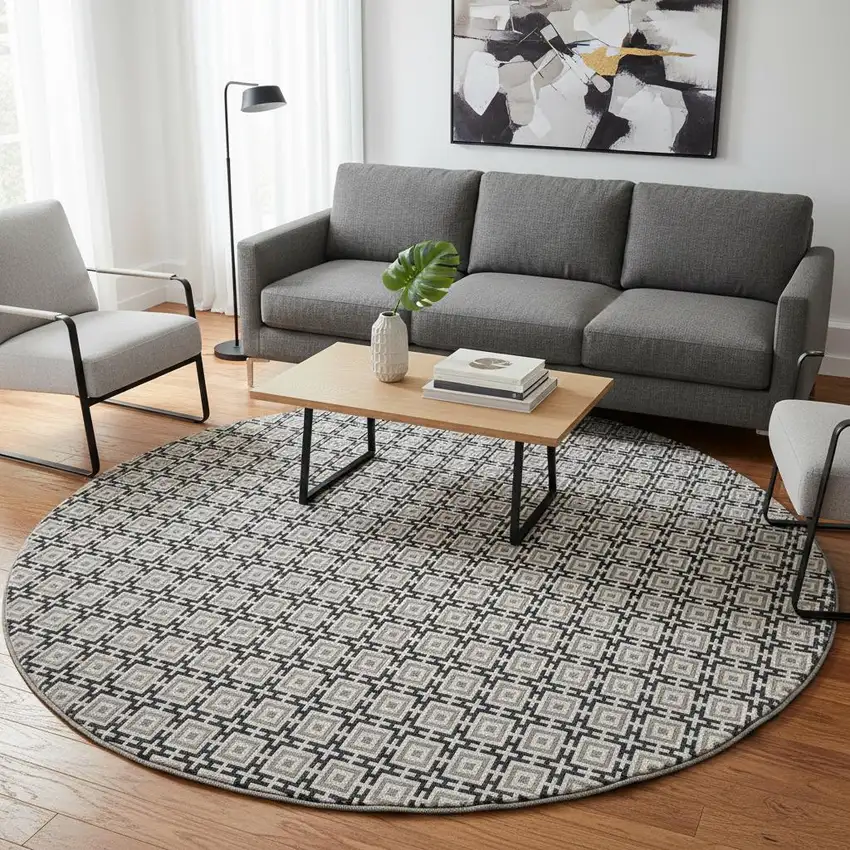 8' Black And Ivory Geometric Washable Round Rug With UV Protection Photo 1