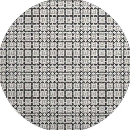 8' Black And Ivory Geometric Washable Round Rug With UV Protection Photo 4