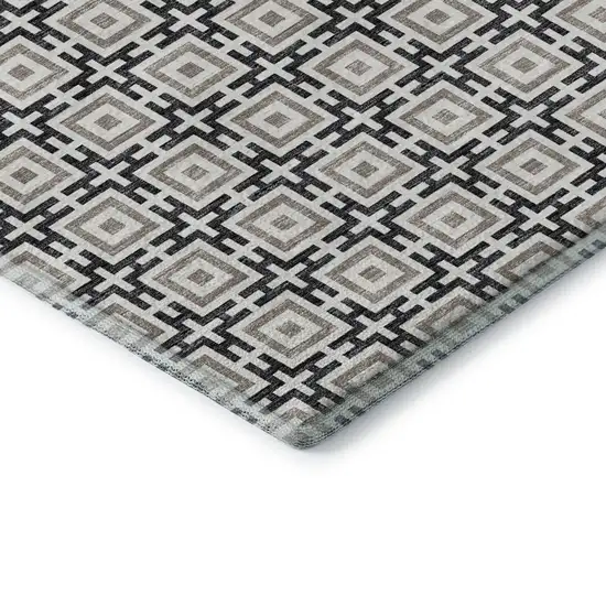 8' Black And Ivory Geometric Washable Round Rug With UV Protection Photo 8