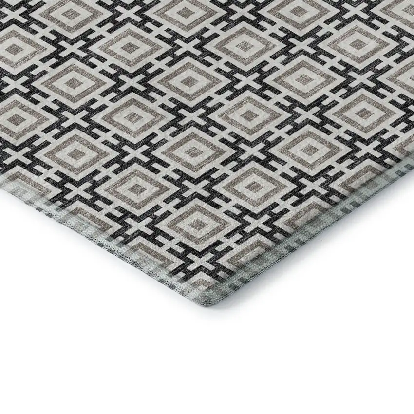 8' Black And Ivory Geometric Washable Round Rug With UV Protection Photo 8