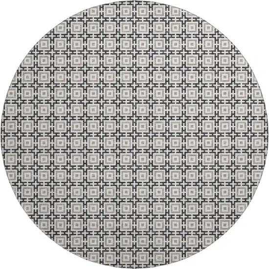 8' Black And Ivory Geometric Washable Round Rug With UV Protection Photo 2