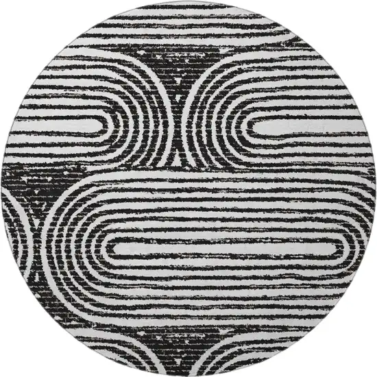 8' Black And Ivory Geometric Washable Round Rug With UV Protection Photo 4
