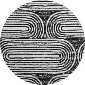 Photo of 8' Black And Ivory Geometric Washable Round Rug With UV Protection