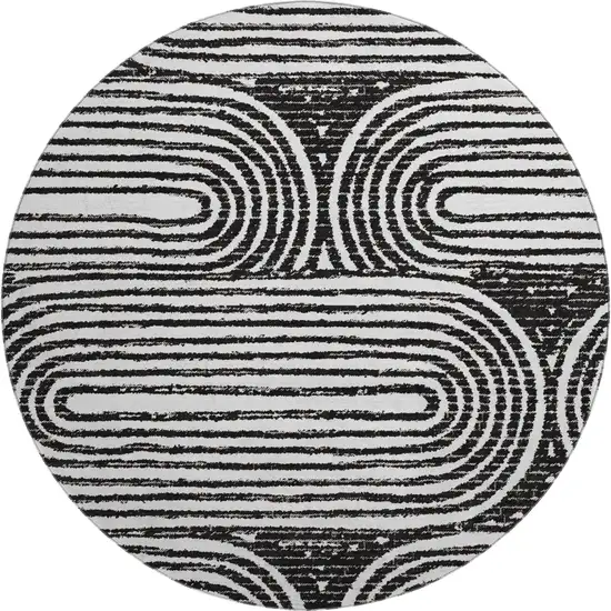 8' Black And Ivory Geometric Washable Round Rug With UV Protection Photo 1