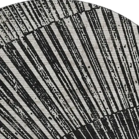 8' Black And Ivory Geometric Washable Round Rug With UV Protection Photo 4