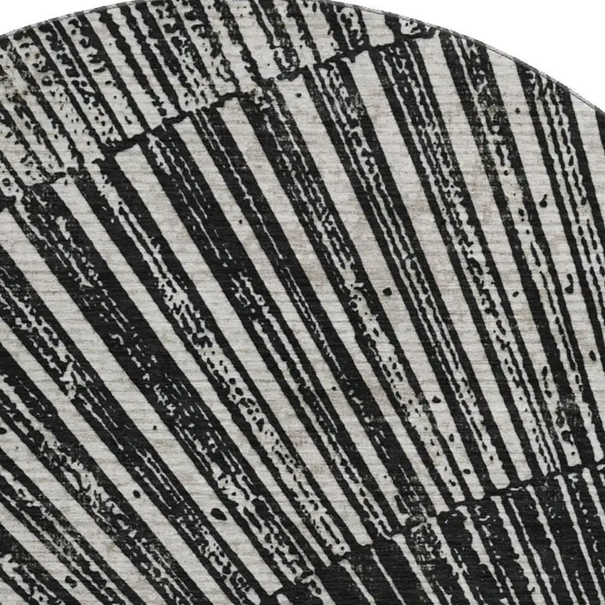 8' Black And Ivory Geometric Washable Round Rug With UV Protection Photo 4