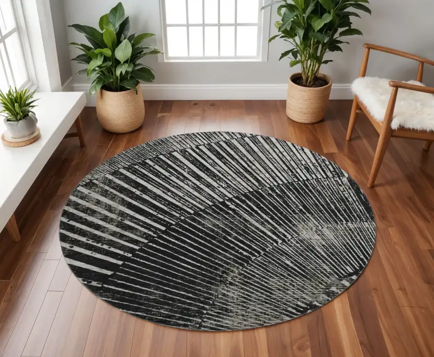 8' Black And Ivory Geometric Washable Round Rug With UV Protection Photo 2