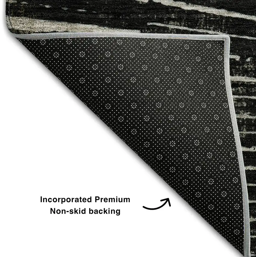 8' Black And Ivory Geometric Washable Round Rug With UV Protection Photo 6