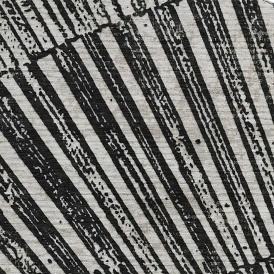 8' Black And Ivory Geometric Washable Round Rug With UV Protection Photo 3