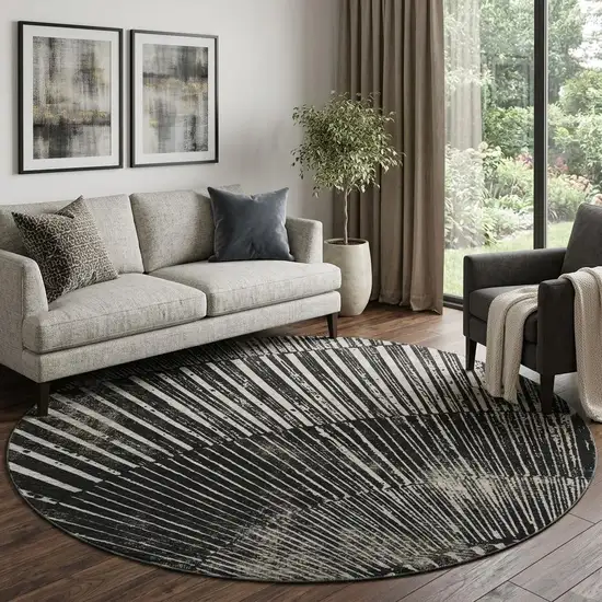 8' Black And Ivory Geometric Washable Round Rug With UV Protection Photo 1
