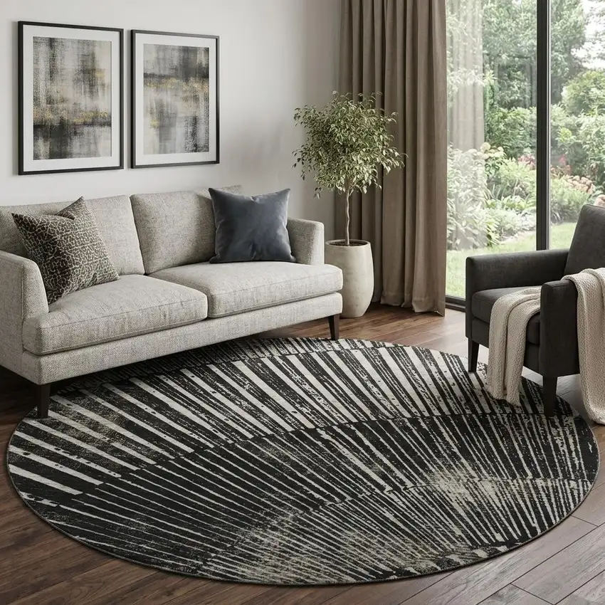 8' Black And Ivory Geometric Washable Round Rug With UV Protection Photo 1