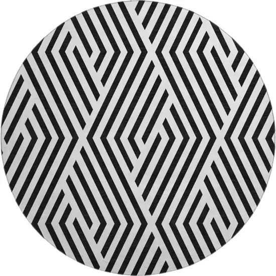 8' Black And Ivory Geometric Washable Round Rug With UV Protection Photo 1