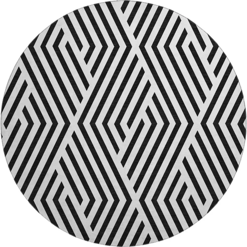 8' Black And Ivory Geometric Washable Round Rug With UV Protection Photo 1