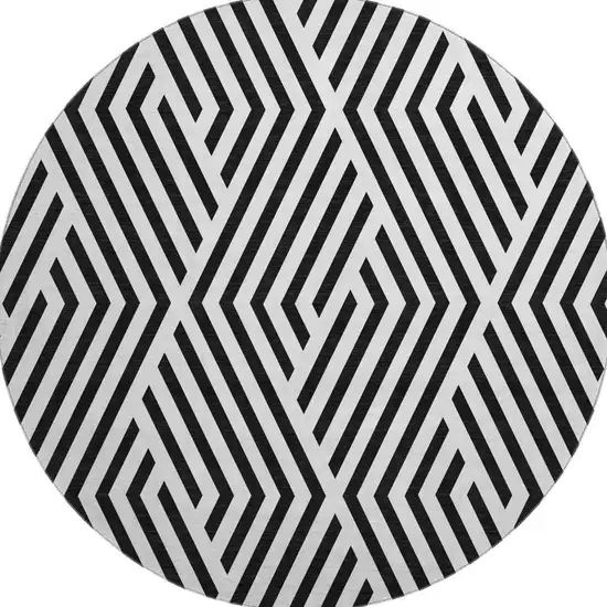 8' Black And Ivory Geometric Washable Round Rug With UV Protection Photo 4